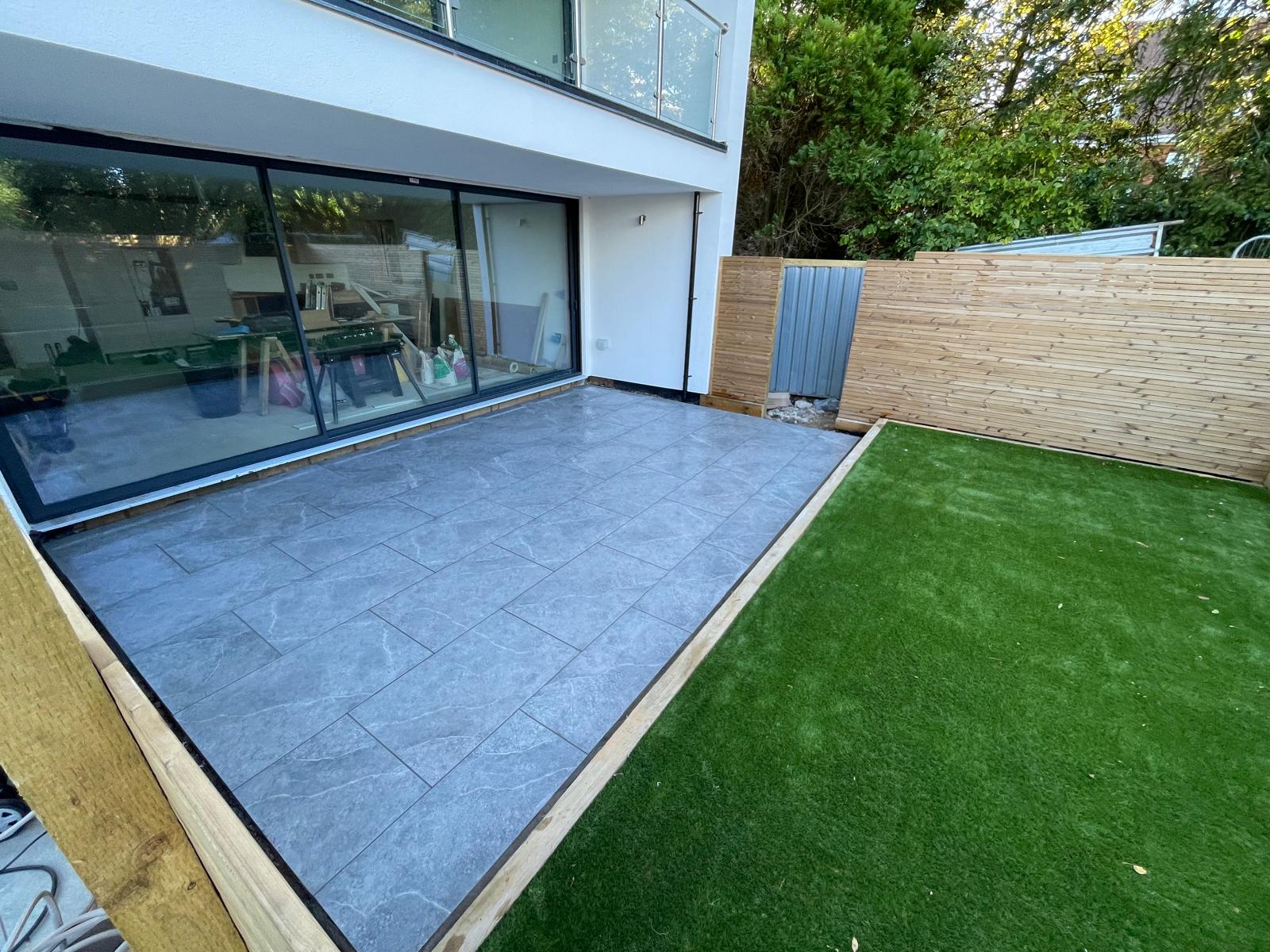 Finished garden patio and artificial lawn